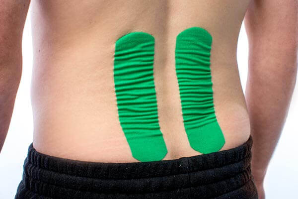 https://www.thysol.us/wp-content/uploads/sites/3/2020/06/lower-back-pain-kinesiology-tape.jpg